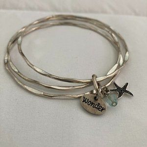 3 silver bracelets with beachy charms